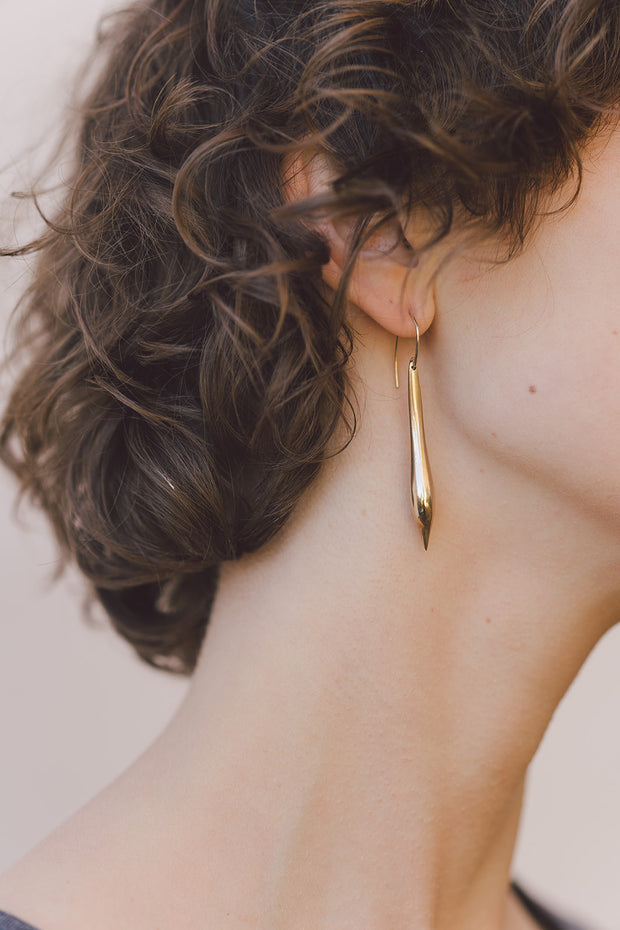 IBIS ELEMENT ARISTO bronze earrings on model close up